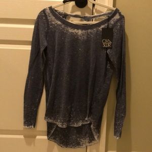 Faded blue long shirt with cut out back